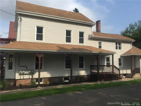 a front view of house with yard