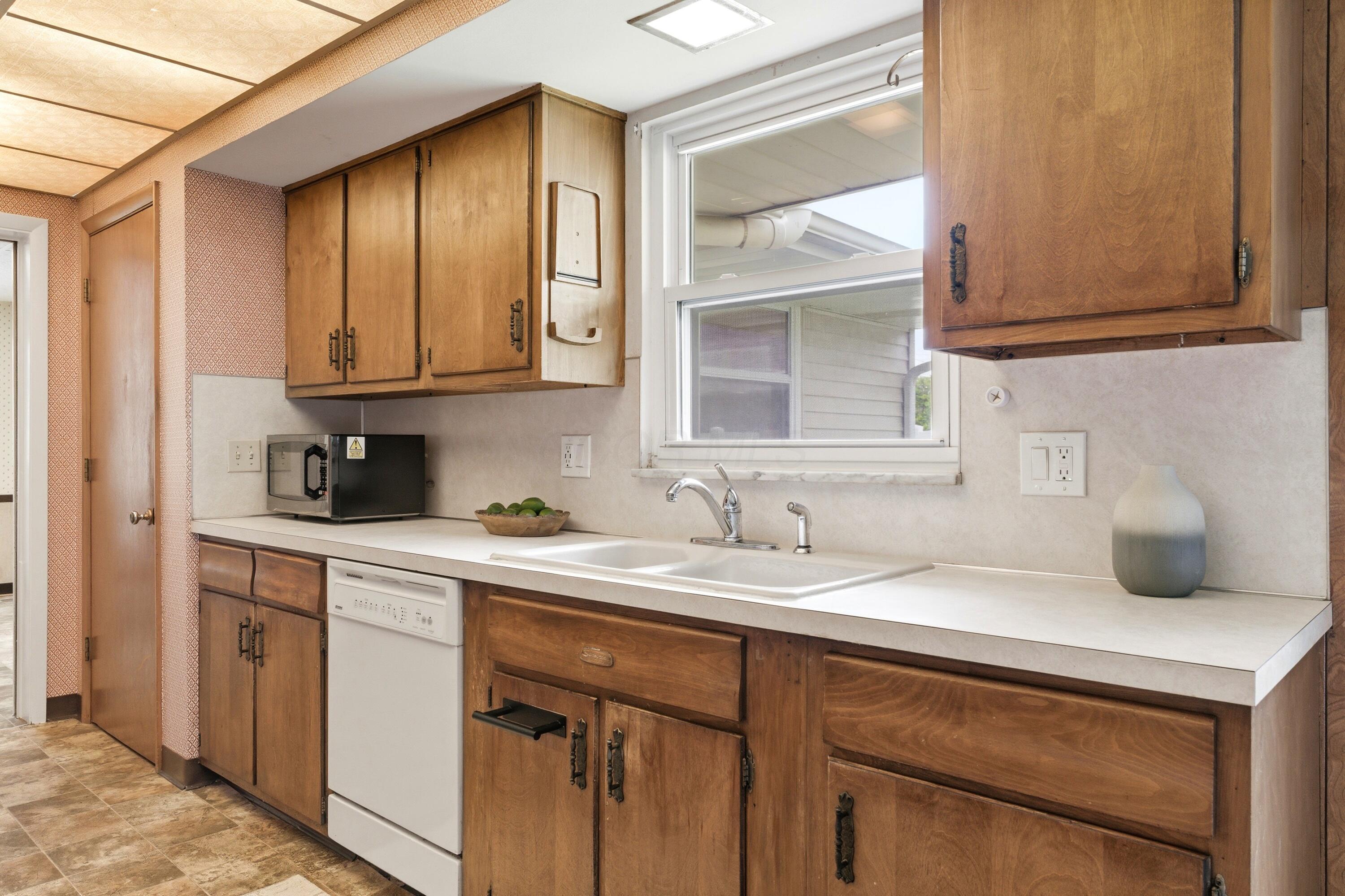 1461 Ridgeview Road Columbus, OH 43221 - Photo 20 of 48 Large Galley Kitchen with plenty of cabinets and potential!