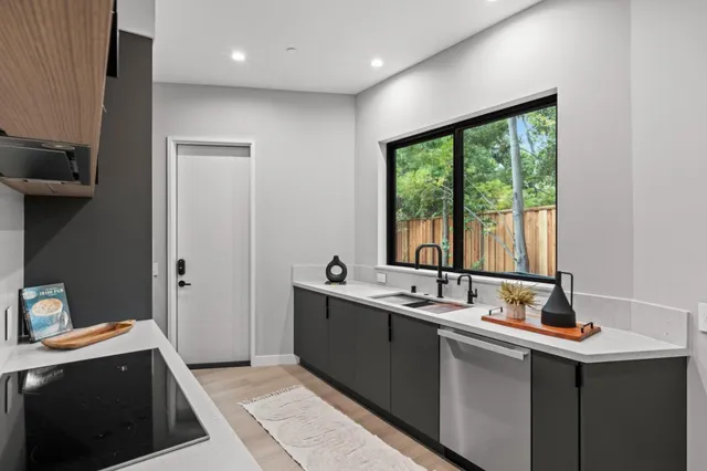a kitchen with a cabinets and window