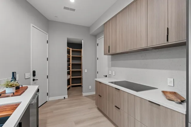 a bathroom with a sink and mirror