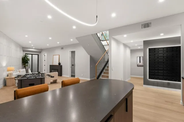 a bathroom with a tub and a mirror