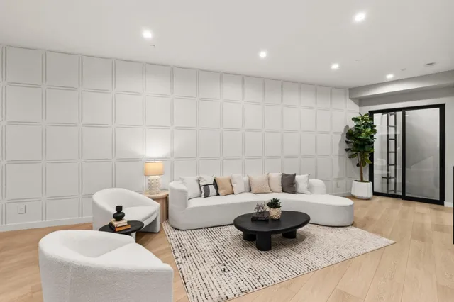 a bathroom with a glass shower door