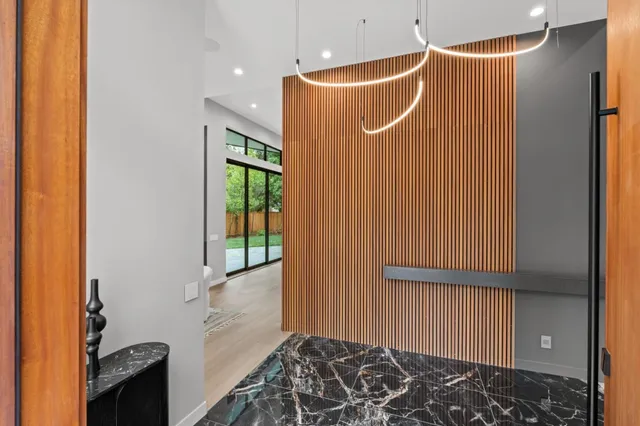 a bathroom with a shower and a sink