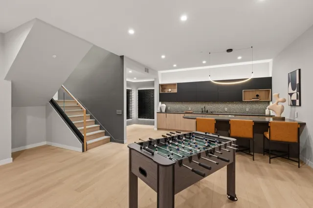 a bedroom with a bed and a mirror