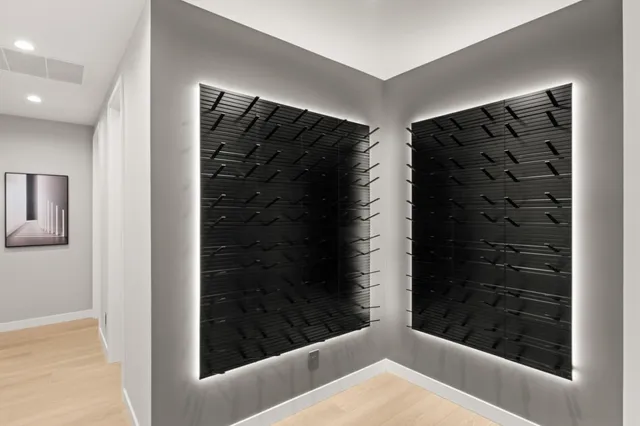 a bedroom with a bed and a night stand