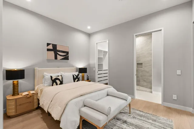 a view of staircase with rug and white walls