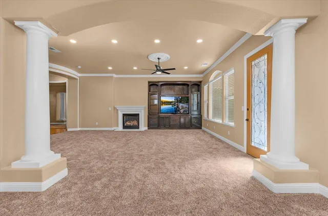 an empty room with windows and outdoor