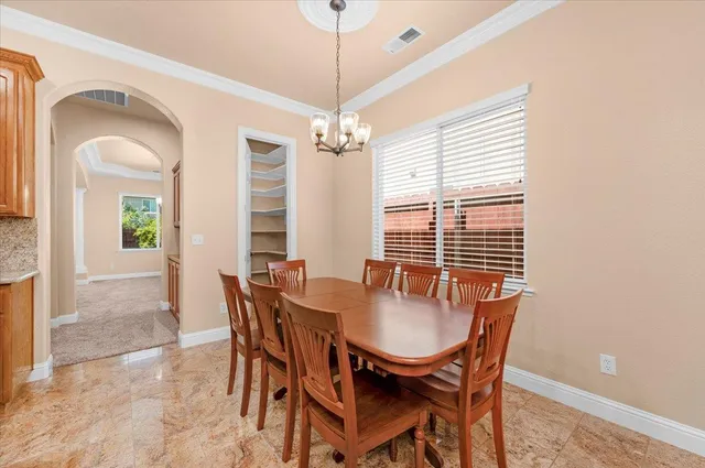 a spacious bathroom with a tub sink and a window