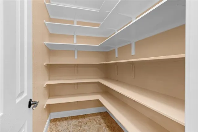 a view of a bathroom with a glass door