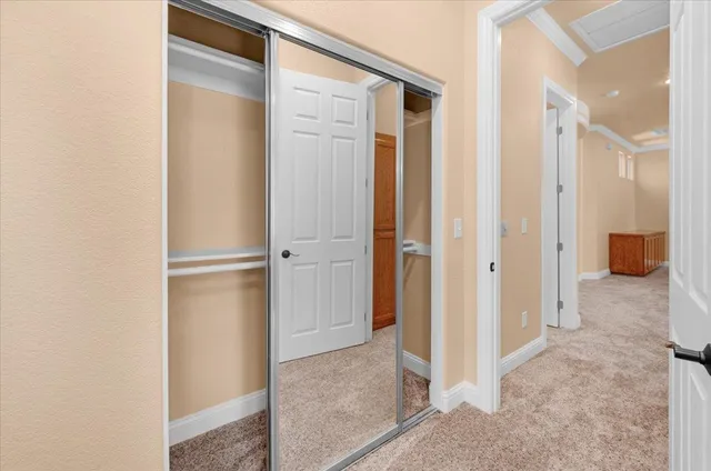 an aerial view of a house with yard