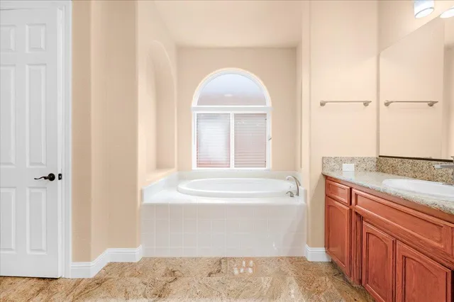 an aerial view of a house with a garden