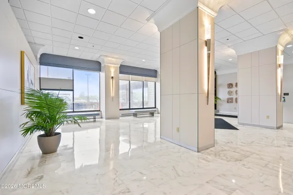 a view of a bathroom with a bathtub and a shower