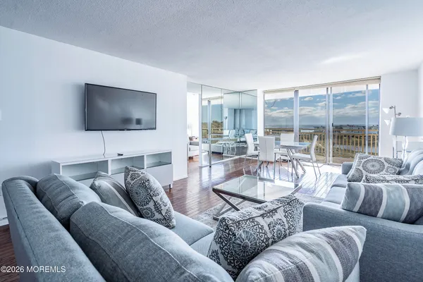 a view of a dining room with furniture window and outside view