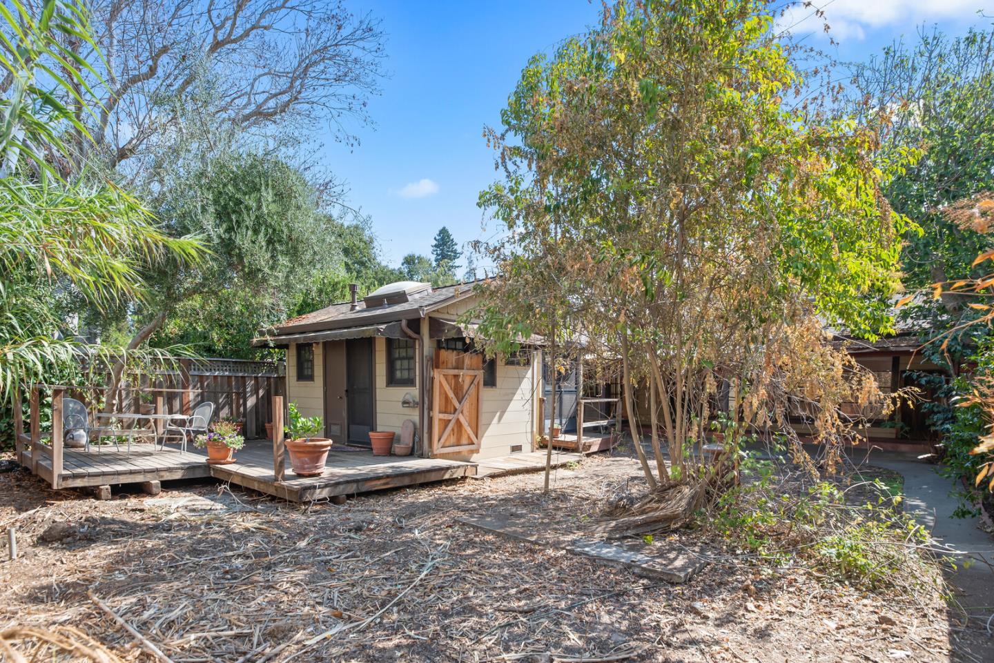 854 Cambridge Avenue Menlo Park, CA 94025 - Photo 18 of 18 a view of a house with backyard and tree