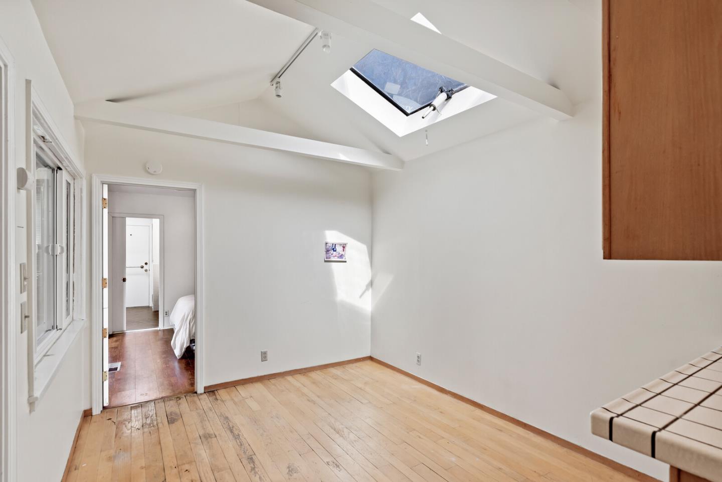854 Cambridge Avenue Menlo Park, CA 94025 - Photo 6 of 18 a view of empty room with wooden floor
