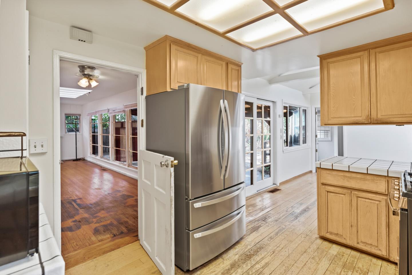 854 Cambridge Avenue Menlo Park, CA 94025 - Photo 9 of 18 a kitchen with stainless steel appliances granite countertop a refrigerator and a stove