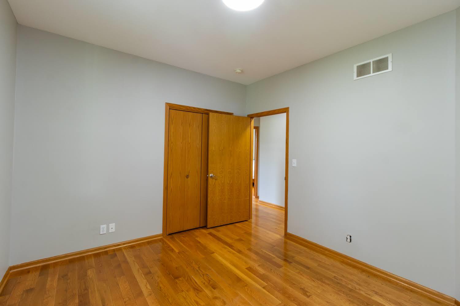 16649 Beaverton Road Capron, IL 61012 - Photo 24 of 48 a view of an empty room with wooden floor