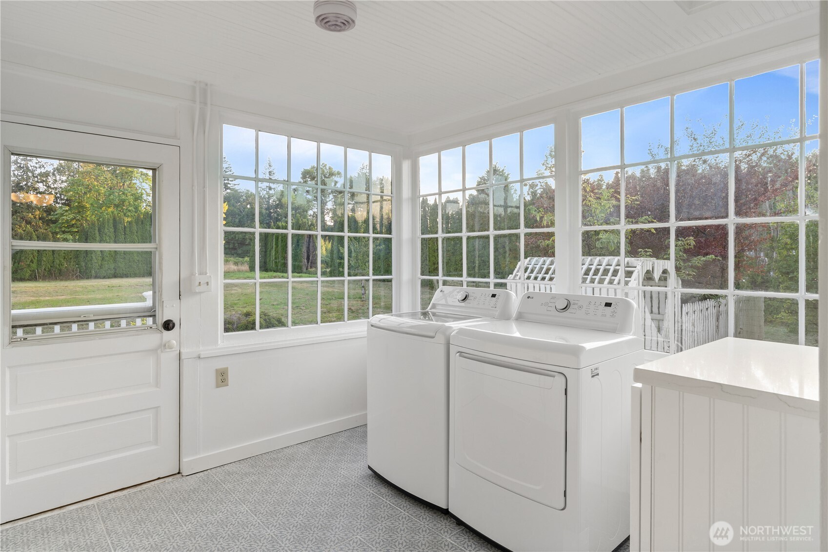 1371 West Axton Road Ferndale, WA 98248 - Photo 14 of 40 a view of a kitchen with a sink and dishwasher cabinets