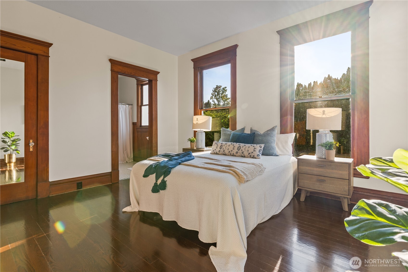 1371 West Axton Road Ferndale, WA 98248 - Photo 15 of 40 a bedroom with a bed and wooden floor