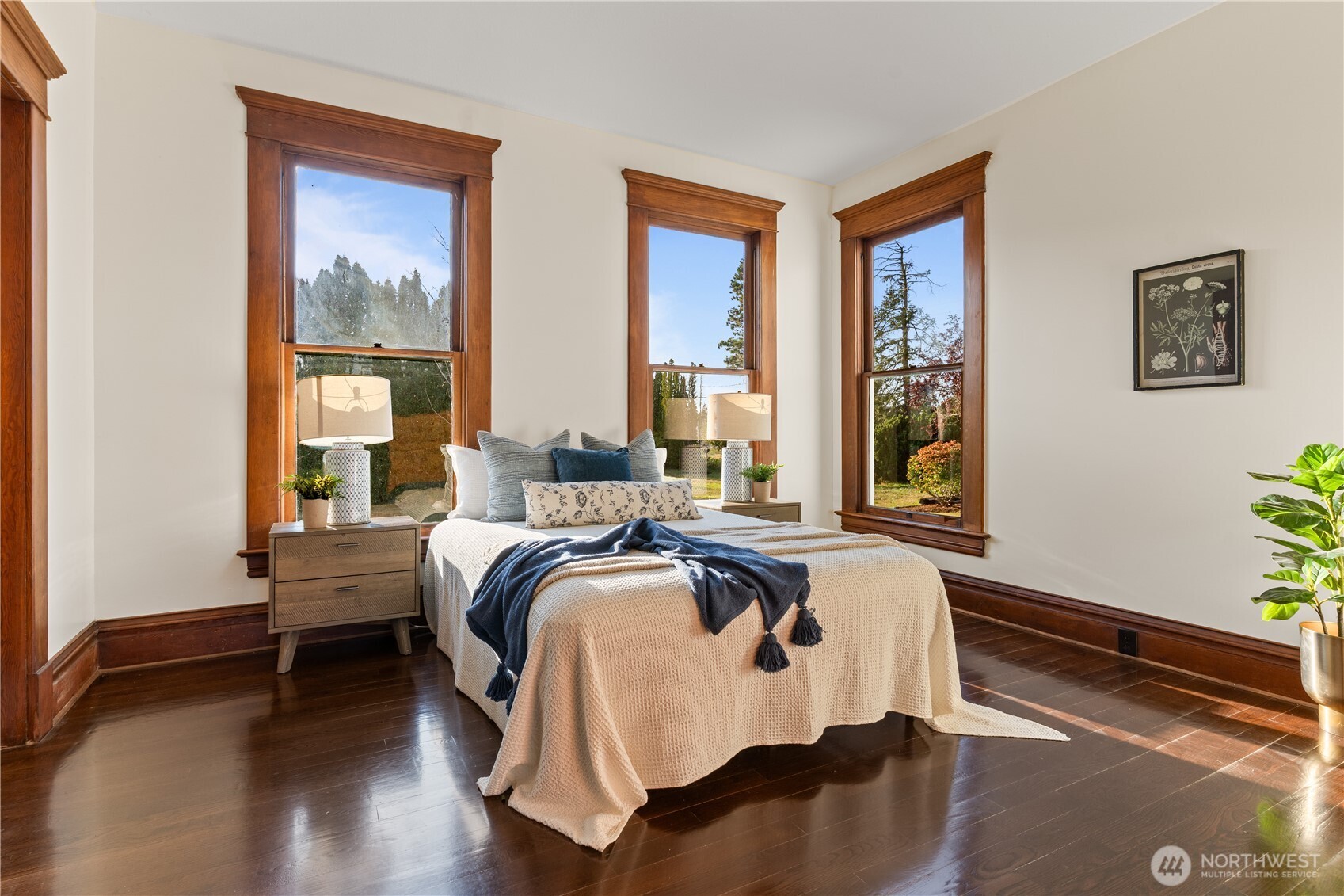 1371 West Axton Road Ferndale, WA 98248 - Photo 16 of 40 a bed sitting in a bedroom next to a window