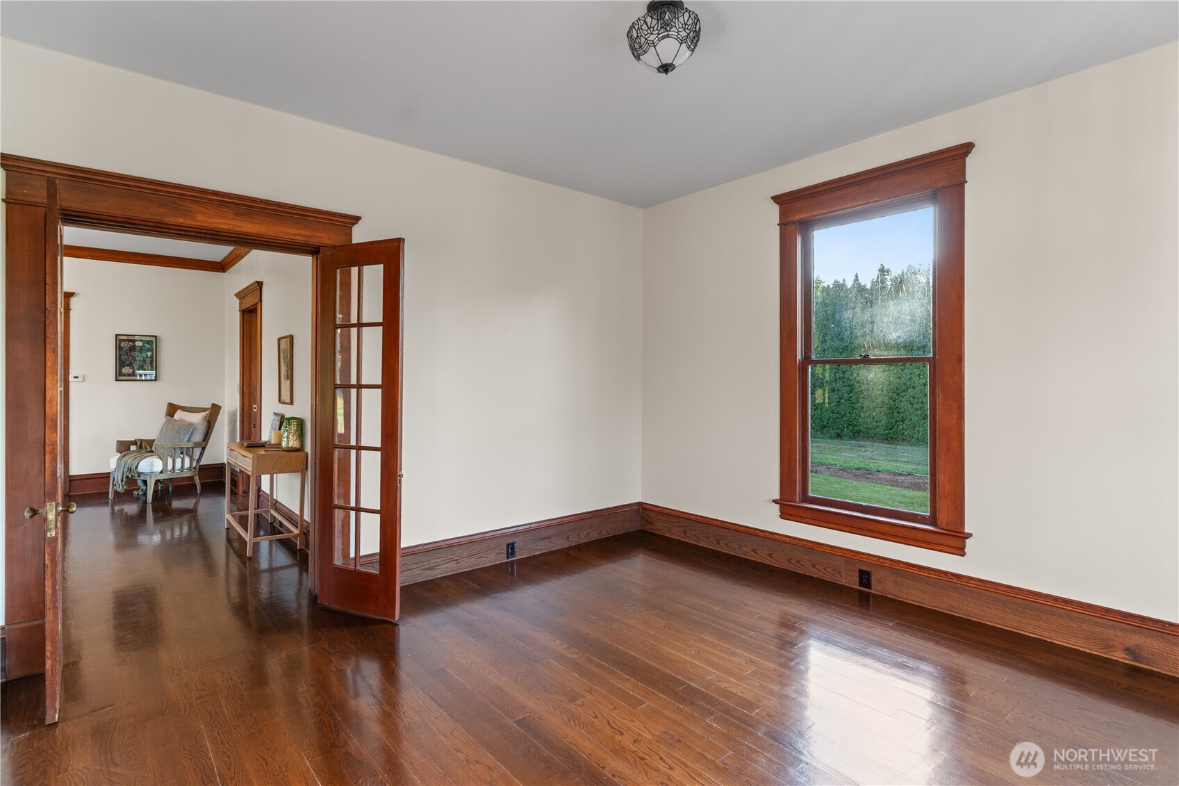 1371 West Axton Road Ferndale, WA 98248 - Photo 19 of 40 wooden floor in an empty room with a window