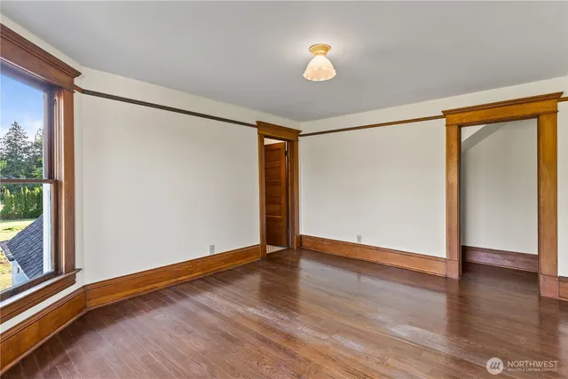 a bathroom with a shower a toilet and a sink