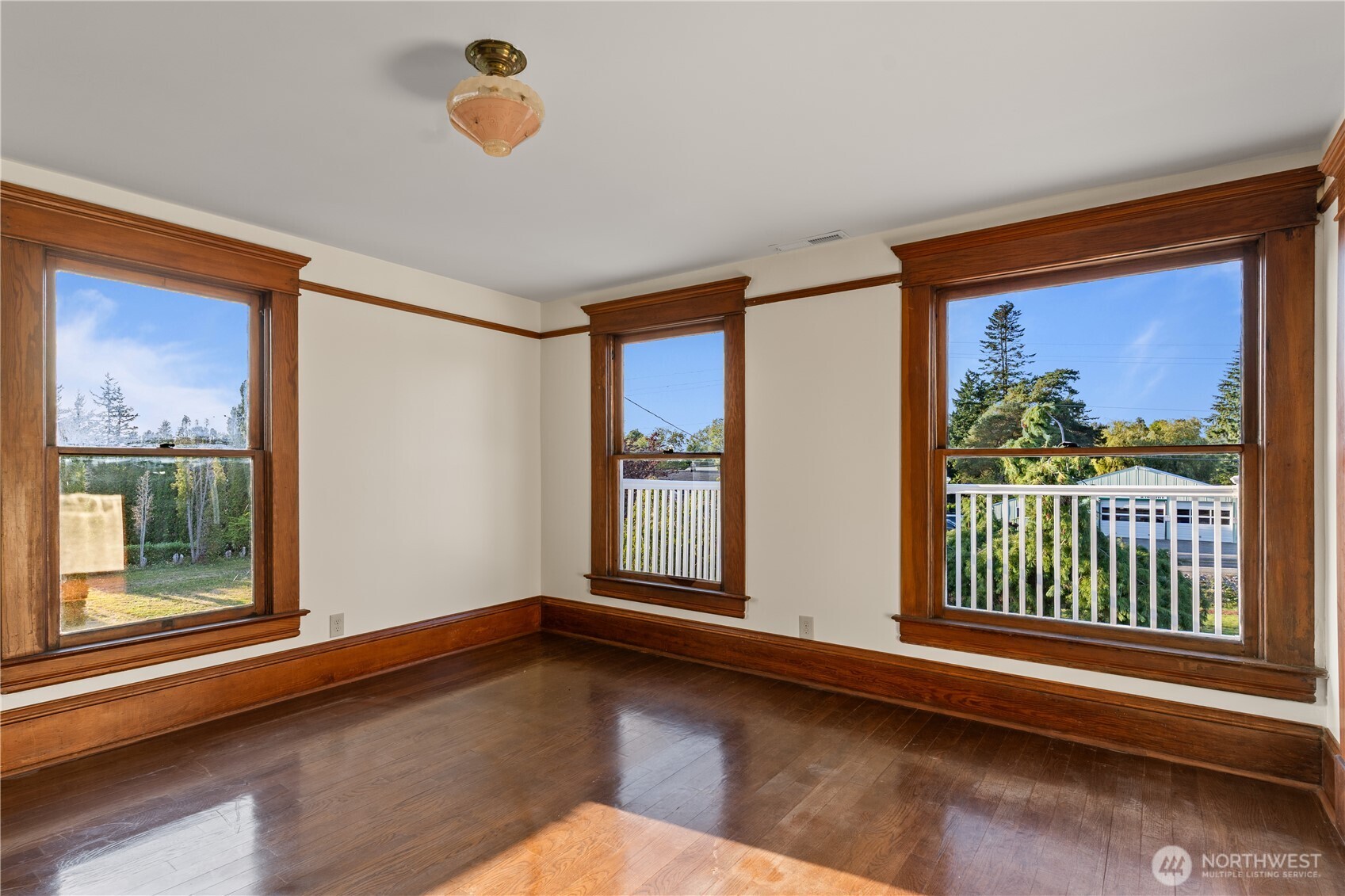 1371 West Axton Road Ferndale, WA 98248 - Photo 23 of 40 a view of a room with wooden floor and windows