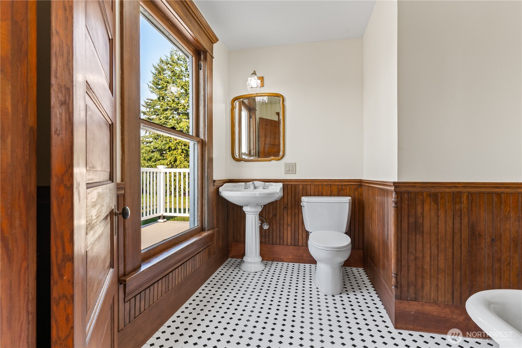1371 West Axton Road Ferndale, WA 98248 - Photo 25 of 40 a bathroom with a toilet and a window