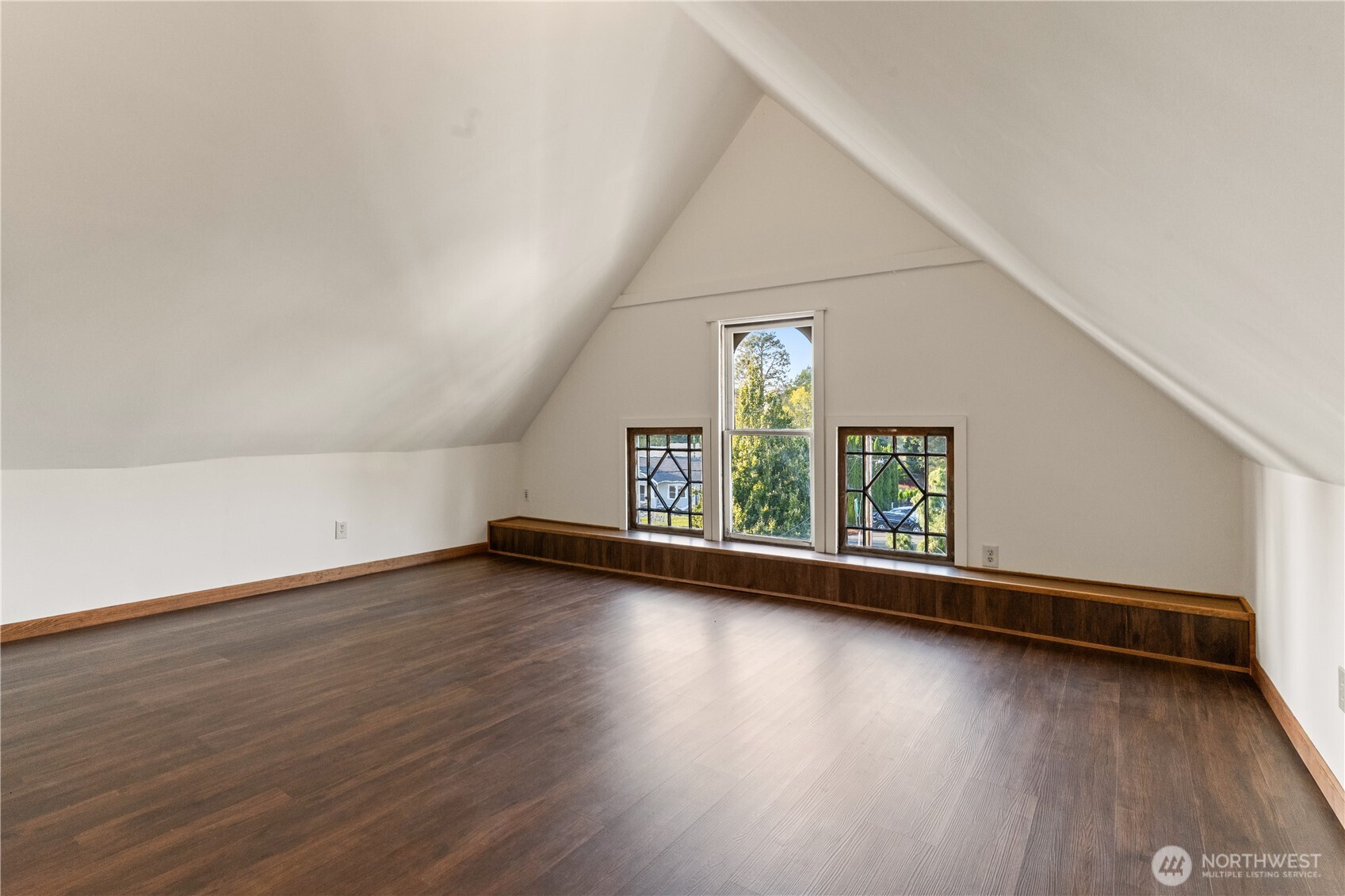 1371 West Axton Road Ferndale, WA 98248 - Photo 33 of 40 an empty room with wooden floor and windows