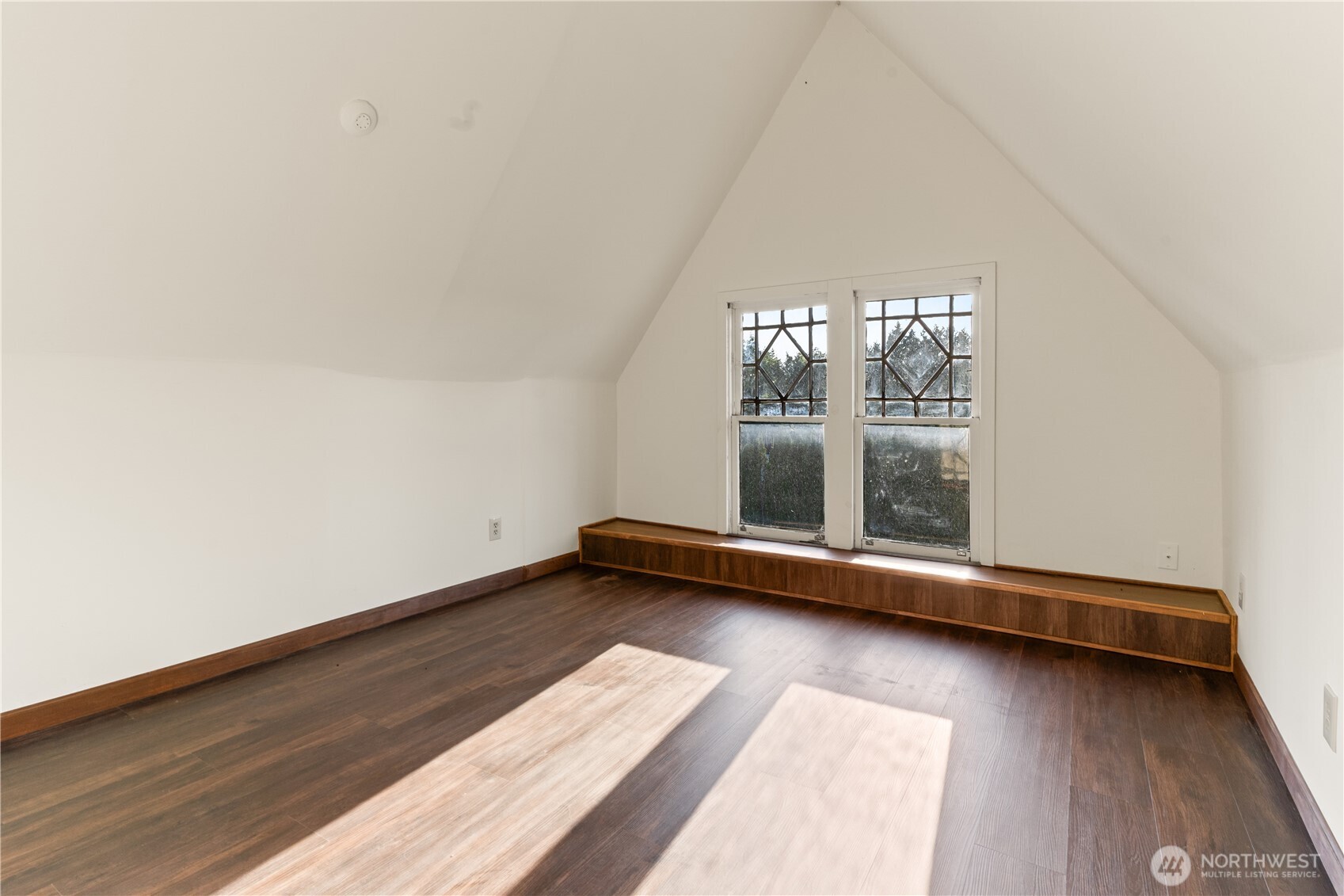 1371 West Axton Road Ferndale, WA 98248 - Photo 35 of 40 an empty room with wooden floor and windows