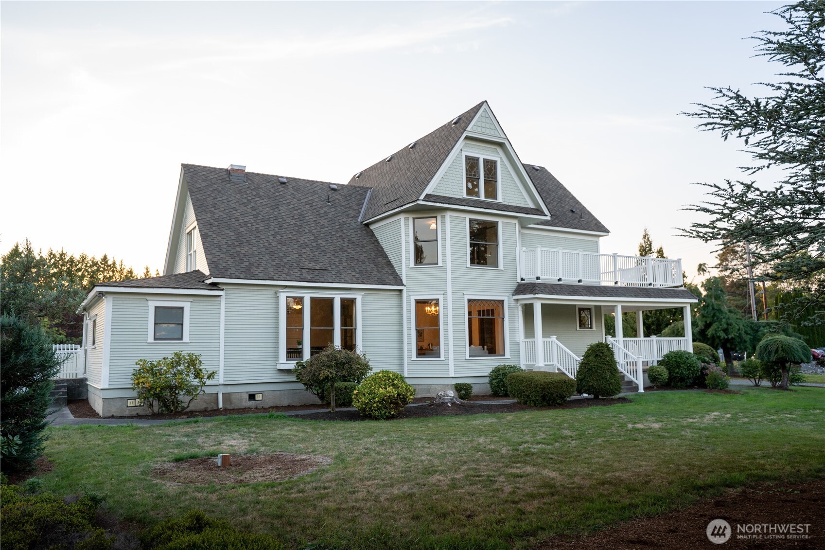 1371 West Axton Road Ferndale, WA 98248 - Photo 37 of 40 a front view of a house with a garden