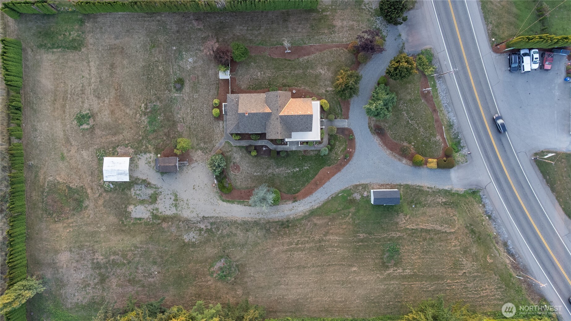 1371 West Axton Road Ferndale, WA 98248 - Photo 39 of 40 an aerial view of a house with a yard