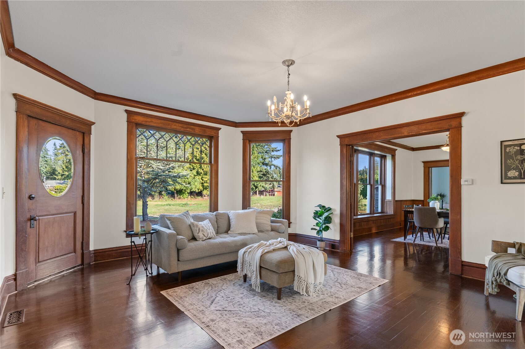 1371 West Axton Road Ferndale, WA 98248 - Photo 6 of 40 a living room with furniture and a chandelier