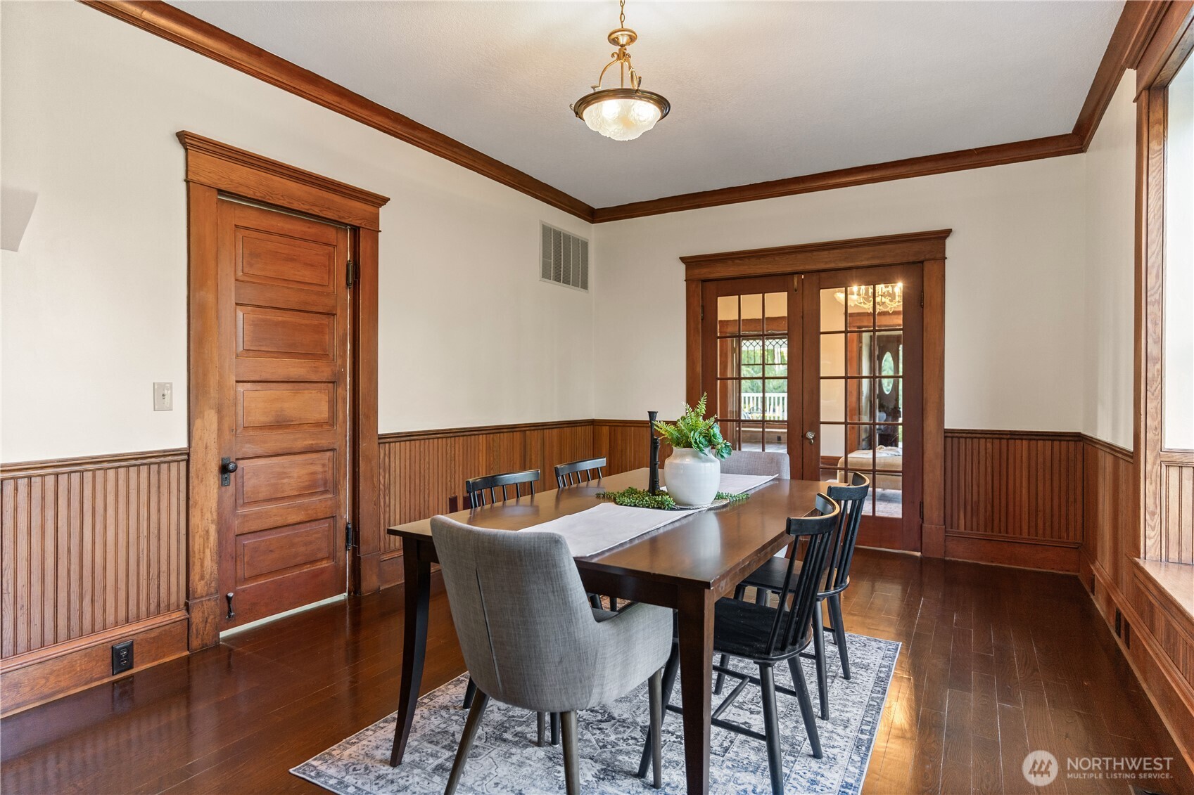 1371 West Axton Road Ferndale, WA 98248 - Photo 8 of 40 a view of a dining room with furniture window and wooden floor
