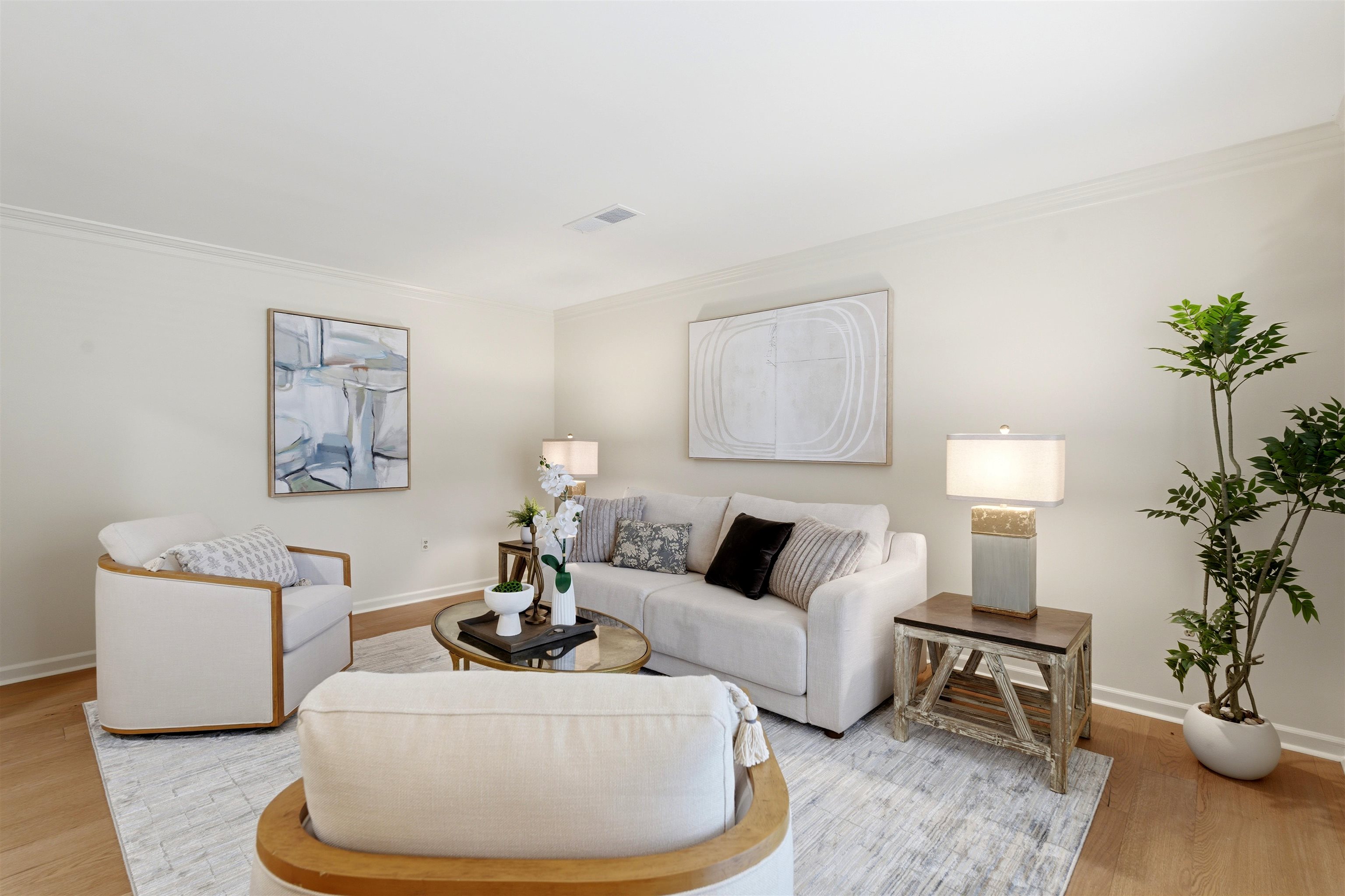 1984 Allenby Road Germantown, TN 38139 - Photo 21 of 37 Light-filled living area featuring wood-finish flooring, crisp white walls, and crown molding