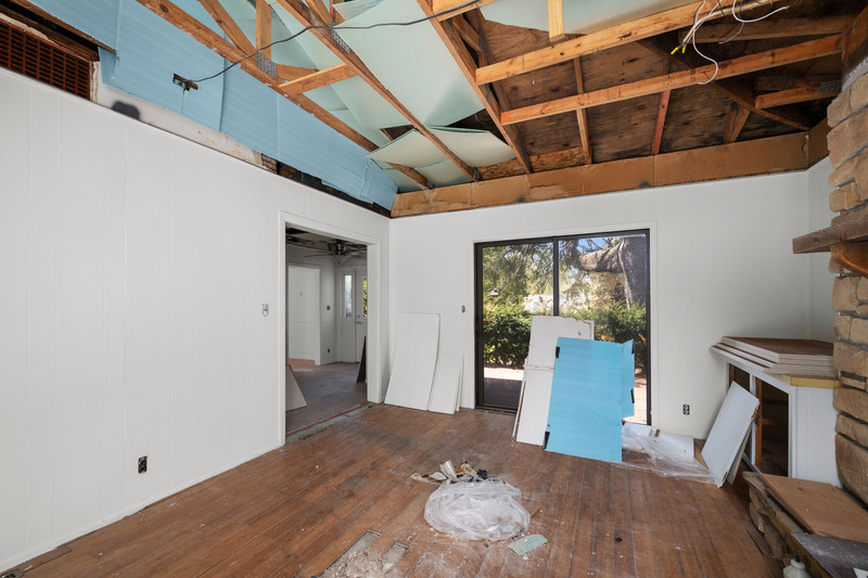 2416 7th Street Moline, IL 61265 - Photo 15 of 27 a view of an empty room with wooden floor and a window