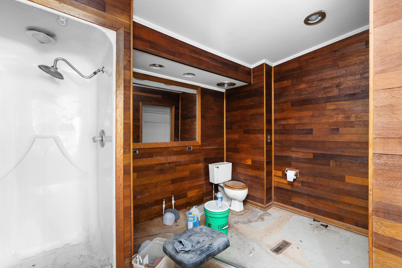 2416 7th Street Moline, IL 61265 - Photo 17 of 27 a bathroom with a toilet shower and a sink