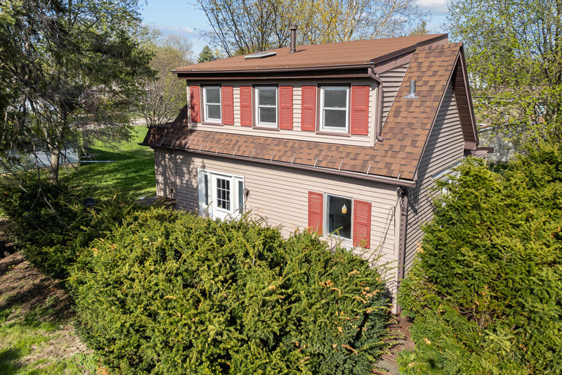 2416 7th Street Moline, IL 61265 - Photo 3 of 27 a front view of a house with a yard