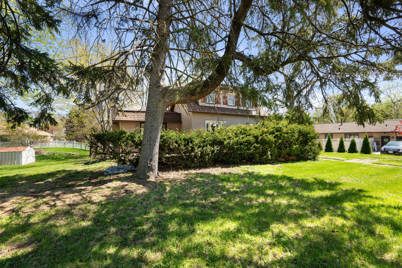 2416 7th Street Moline, IL 61265 - Photo 6 of 27 a view of a house with a yard