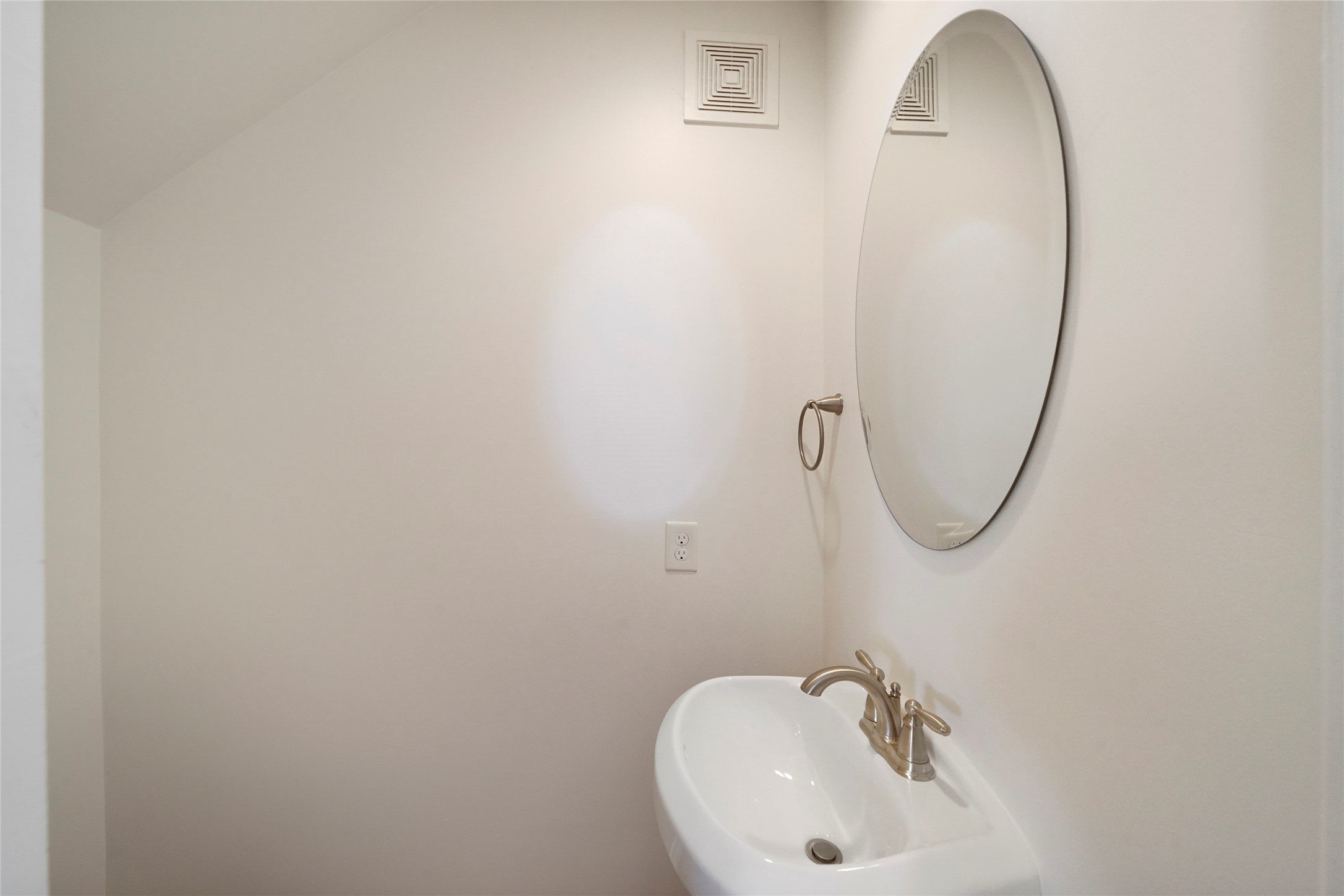 724 Link Road Houston, TX 77009 - Photo 8 of 20 Tucked beneath the stairs is your
powder room, perfect for visiting
guests or family.