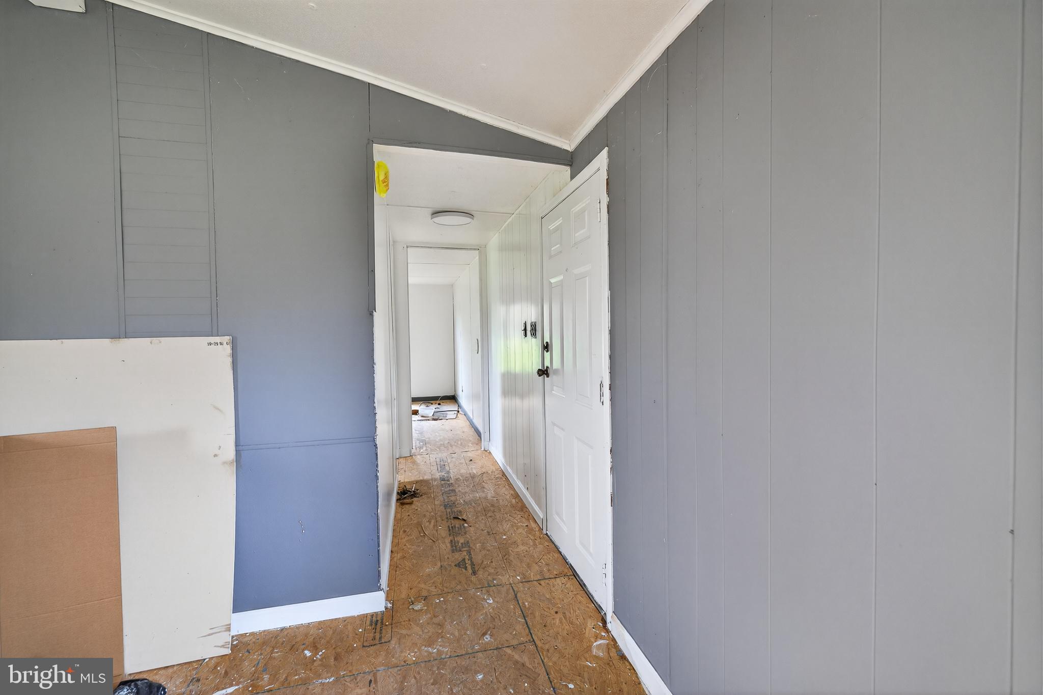 2414 Arthursville Road Hartly, DE 19953 - Photo 22 of 45 a view of a hallway with a white walls