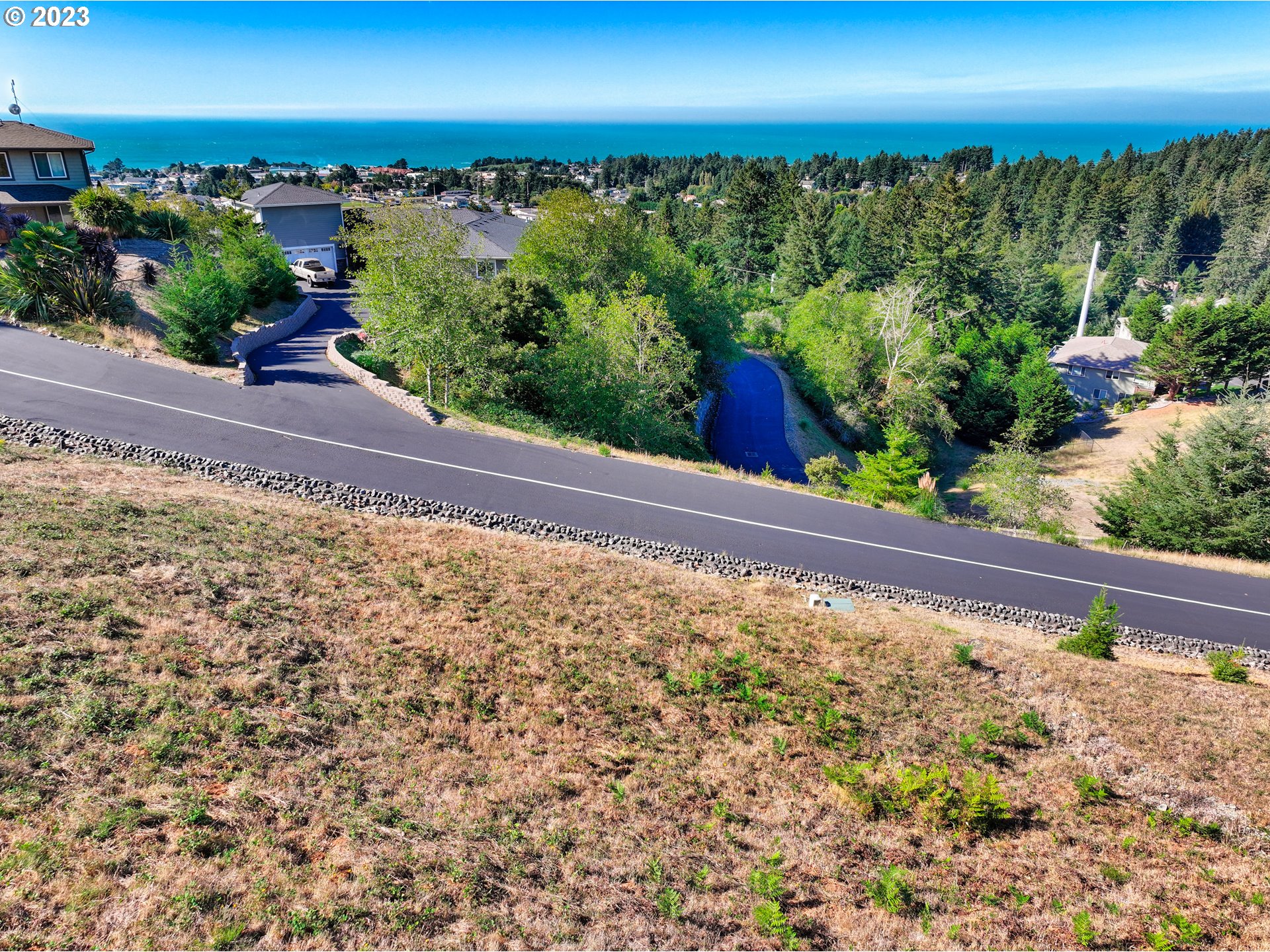 Pacific Terrace Drive Brookings, OR 97415 - Photo 5 of 14 a view of a yard with a garden