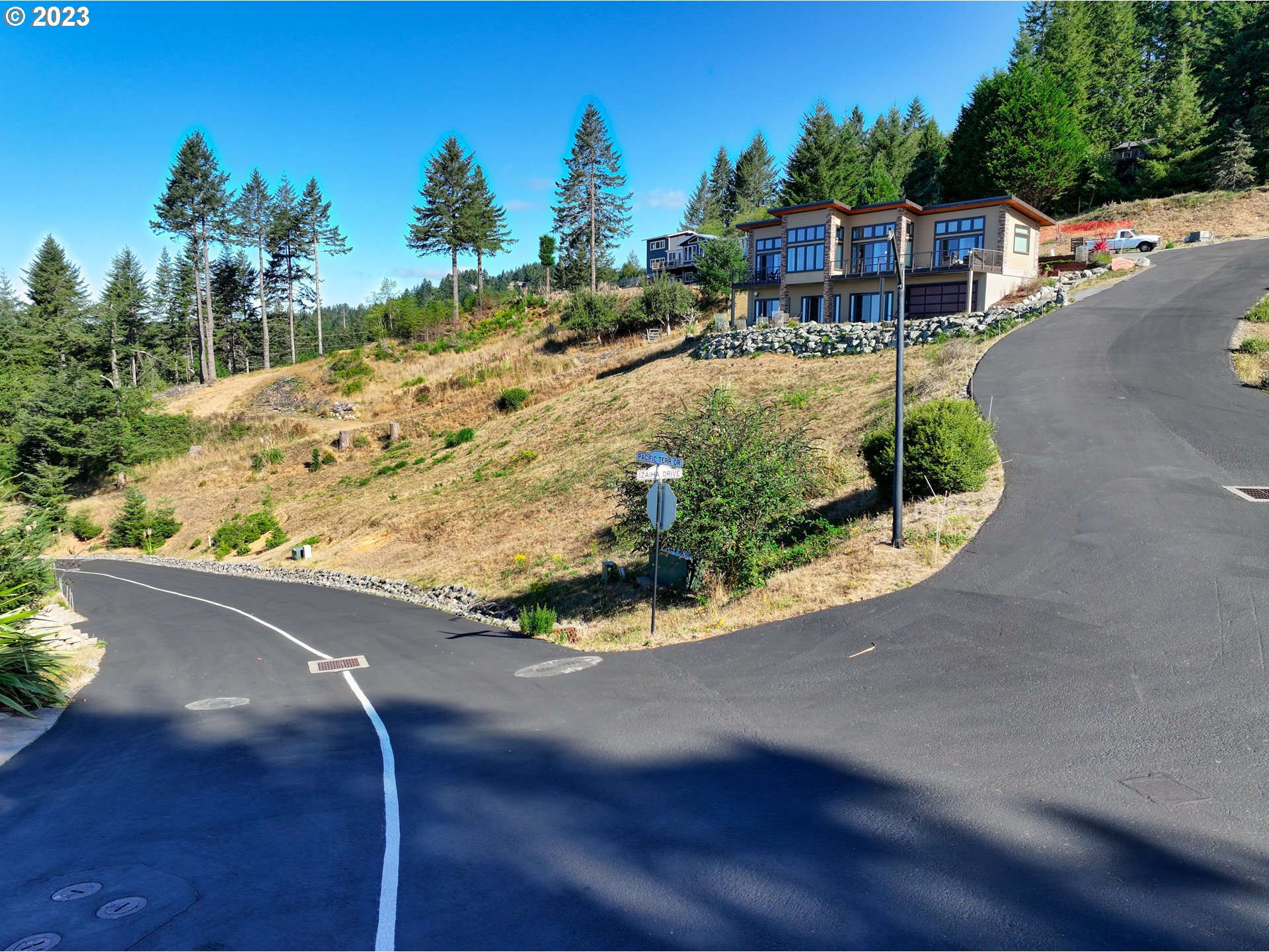 Pacific Terrace Drive Brookings, OR 97415 - Photo 6 of 14 a view of a house with a yard
