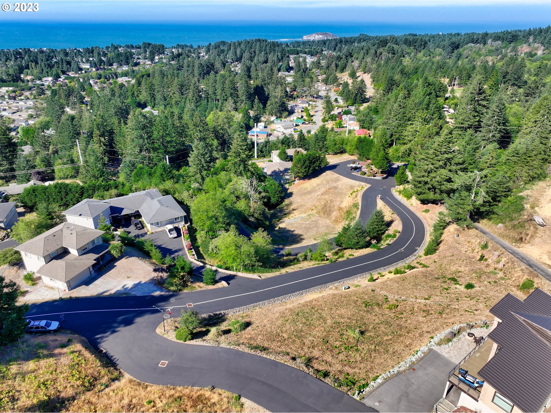 Pacific Terrace Drive Brookings, OR 97415 - Photo 10 of 14 an aerial view of a house with a yard