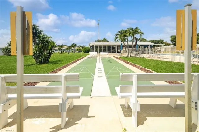 a view of a swimming pool with a balcony
