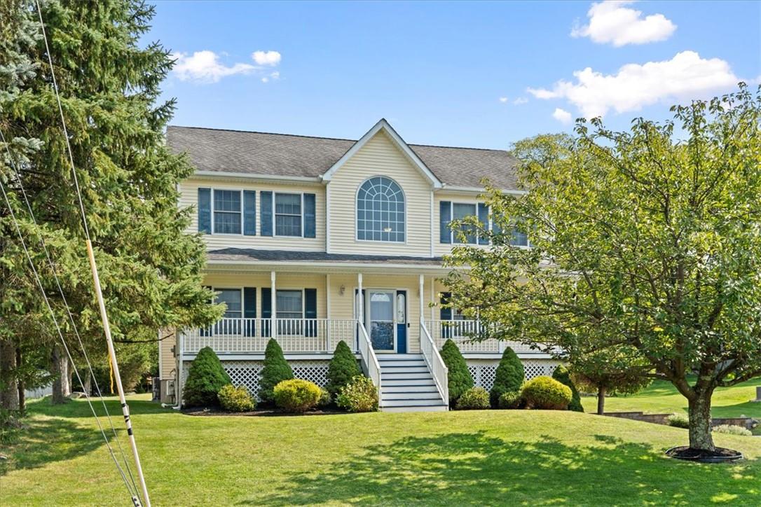 34 McGarrah Road Monroe, NY 10950 - Photo 1 of 1 a front view of a house with garden