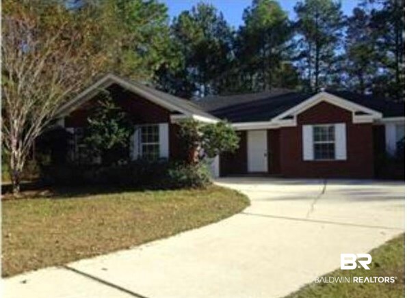 9825 Blue Bonnet Court Semmes, AL 36575 - Photo 1 of 1 Ranch-style house with driveway