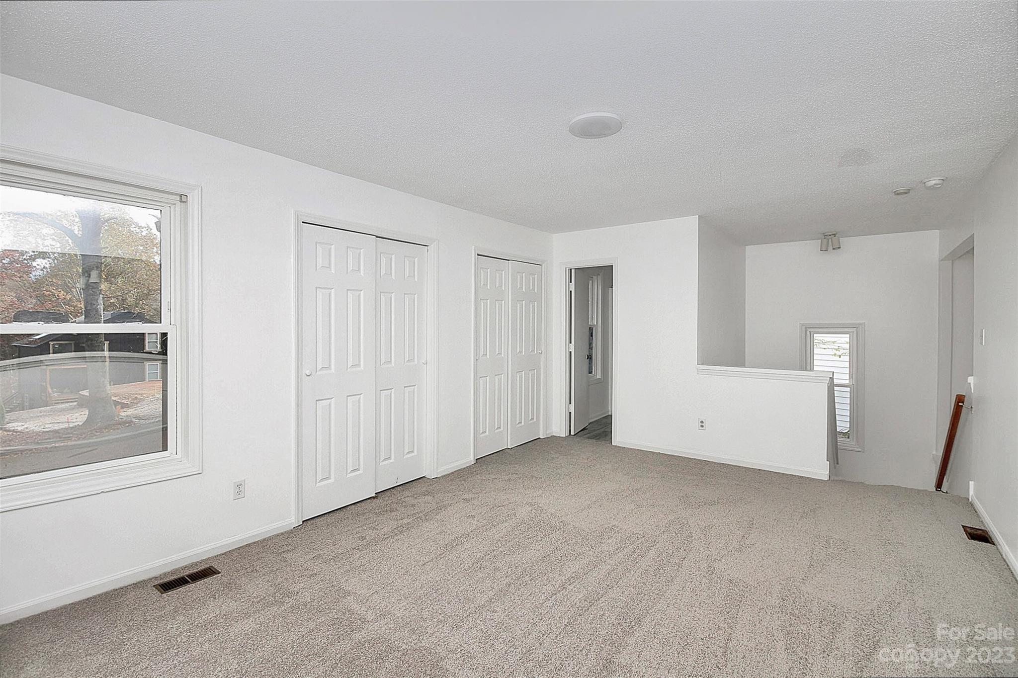 27051 Catamaran Drive Tega Cay, SC 29708 - Photo 12 of 35 a view of an empty room with a window