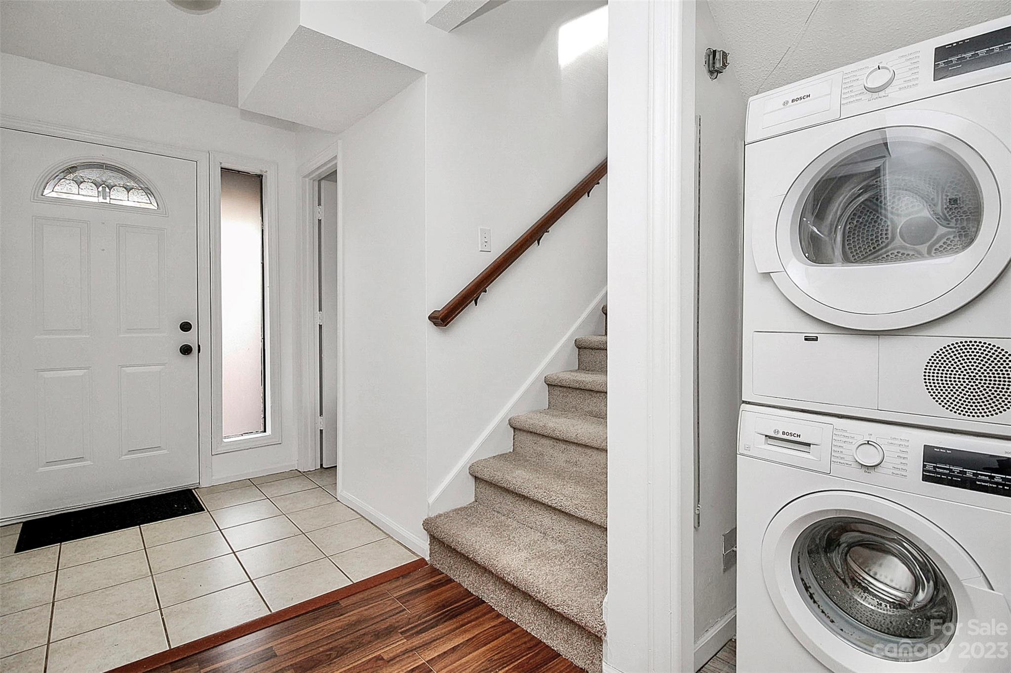 27051 Catamaran Drive Tega Cay, SC 29708 - Photo 16 of 35 a view of a hallway with washer and dryer