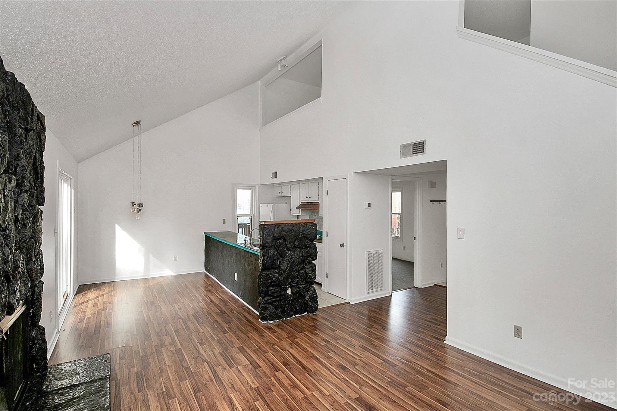 27051 Catamaran Drive Tega Cay, SC 29708 - Photo 21 of 35 a view of a hallway with wooden floor